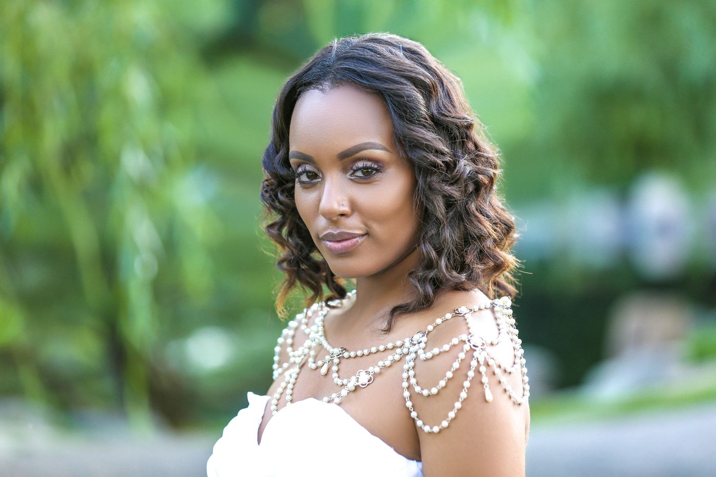 Bridal portrait with a pearl shoulder piece